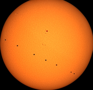 2016 Mercury Transit Composite - the true north south orientation of the sun along with the various snapshots of the planet skirting across the visible disk.